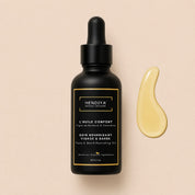 Bottle of Hendiya L'Huile Confort, nourishing face and beard oil for men with prickly pear seed oil and calendula, amber glass packaging with dropper.